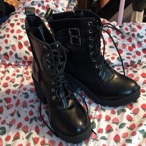 Black heeled combat boots